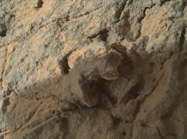 Sol 303: Mars Hand Lens Imager (MAHLI)